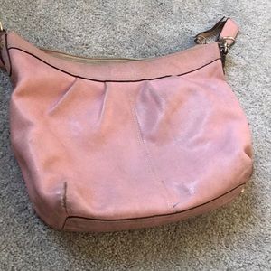 Coach purse...Pink in color in fair condition
